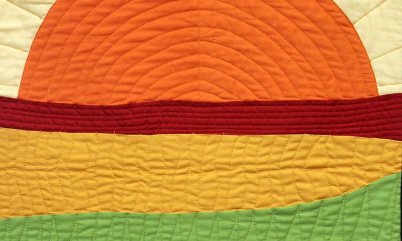 Quilted sunrise art piece