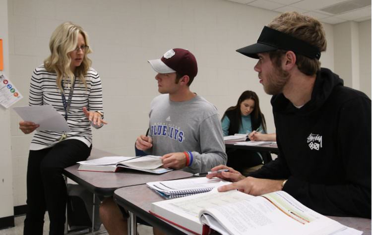 Accounting teacher in class with students