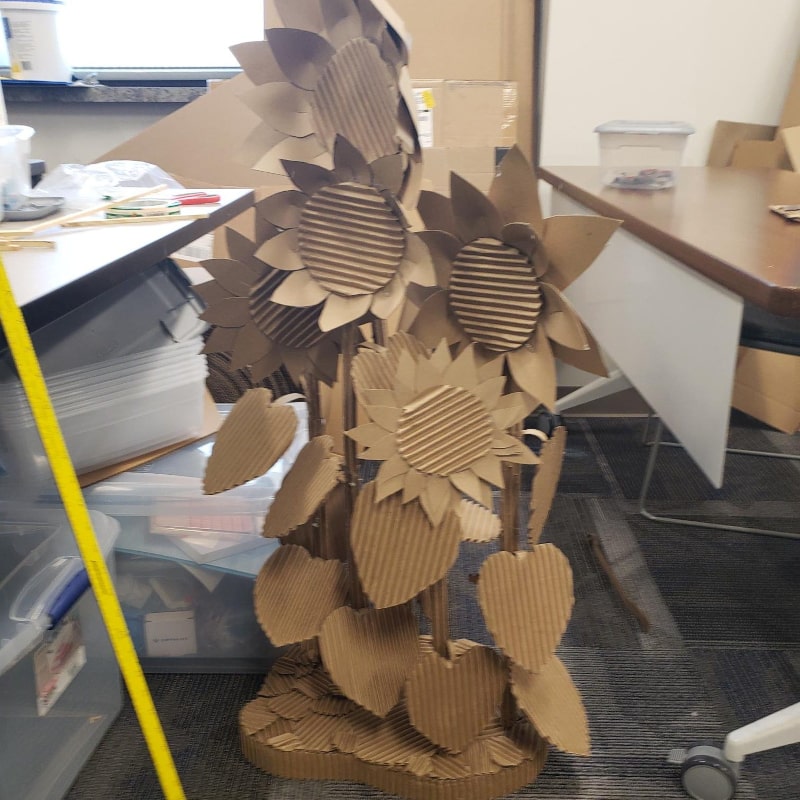 Cardboard sculpture of sunflower plant