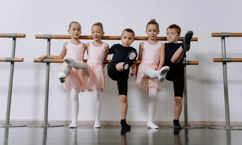 Group of young students practicing ballet
