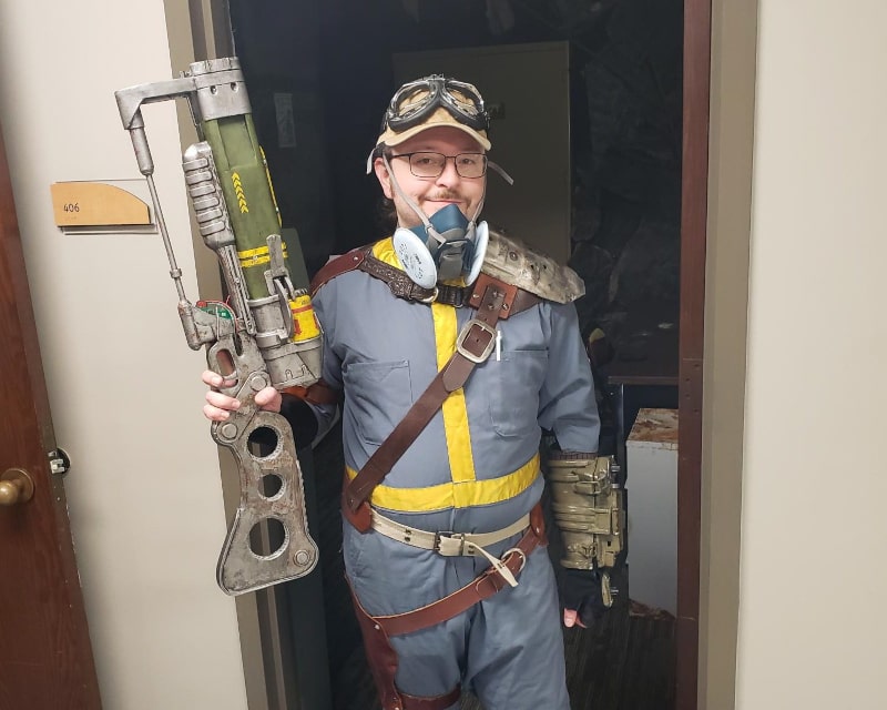 Escape room host dressed in Fallout-style outfit