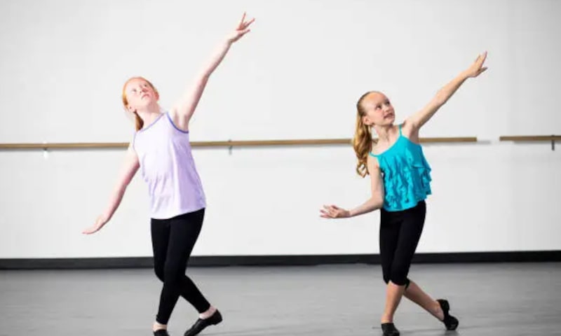 Two girls dancing in dance studio