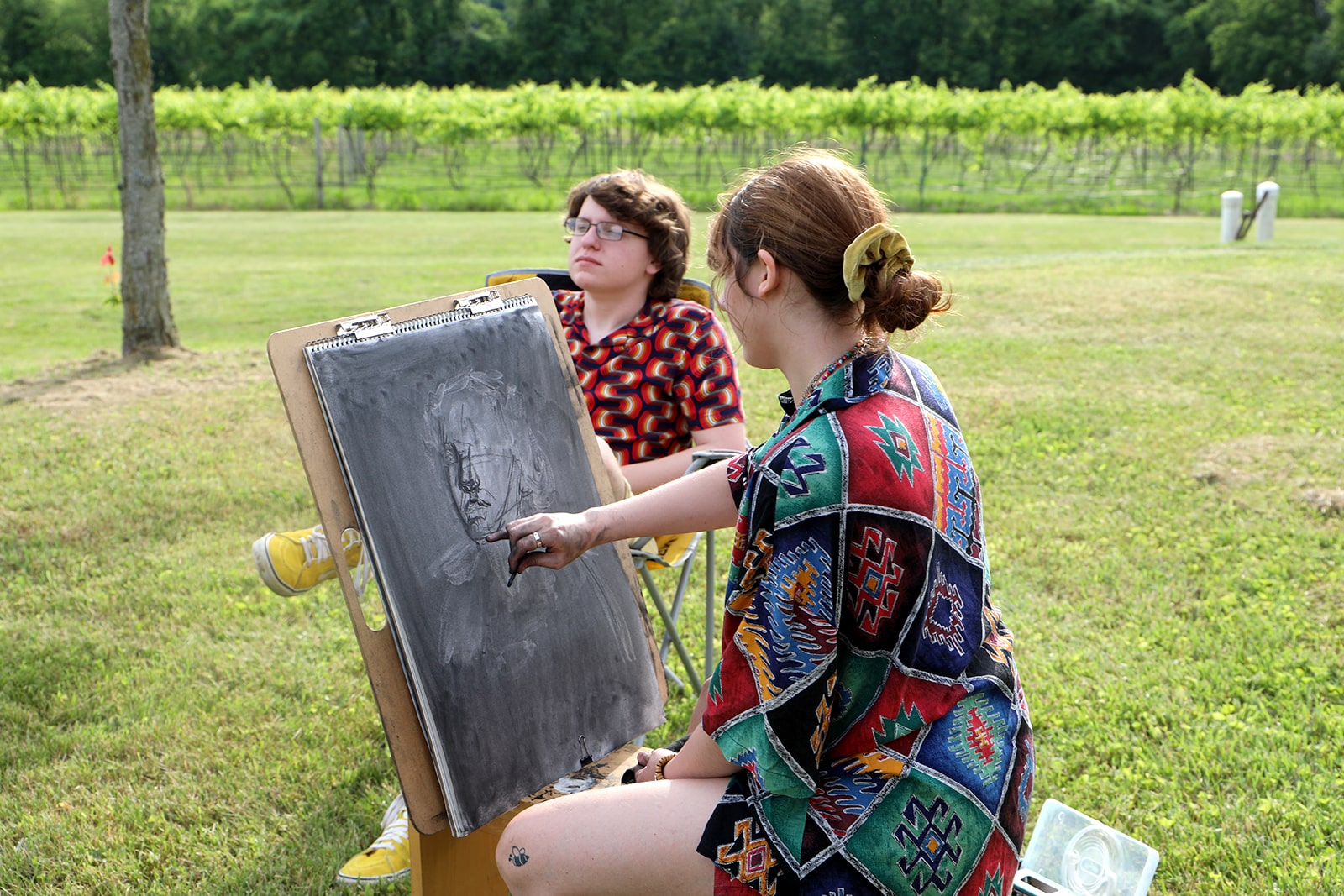 Art students painting outdoors