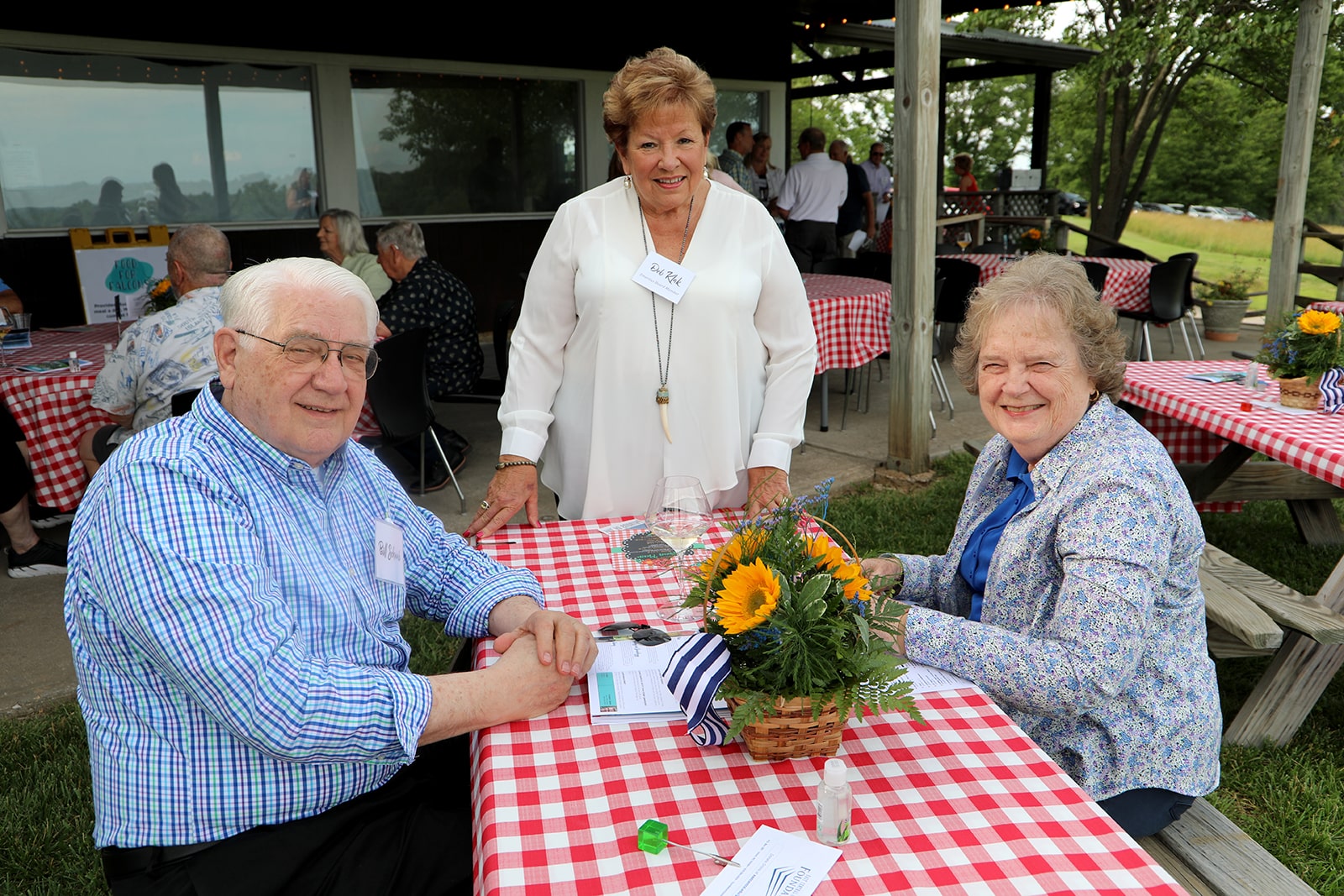 Patrons of the Arts smiling for camera at kick-off event