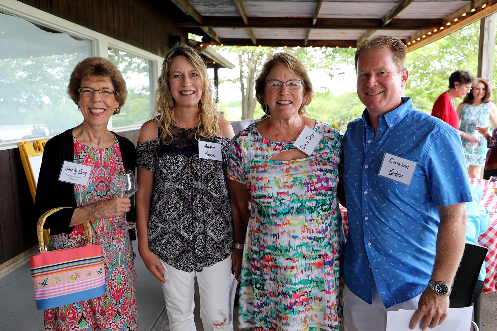Patrons of the Arts smiling for camera at kick-off event