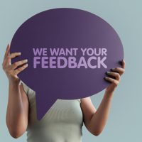 Speech bubble with text: We want your feedback