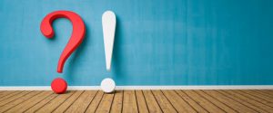 istockphoto-1139609205-612x612 Exclamation point and Question Mark leaning on concrete wall
