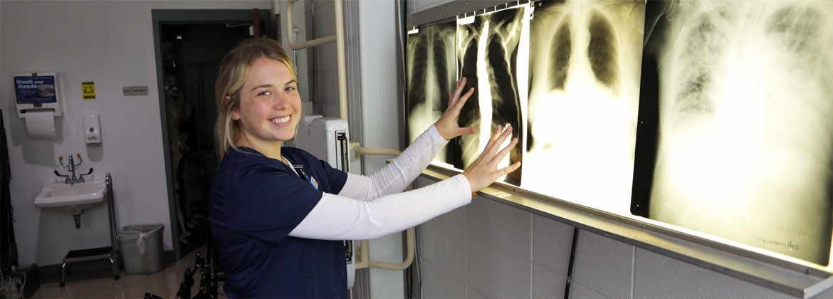 Radiologic technology student smiling at the camera