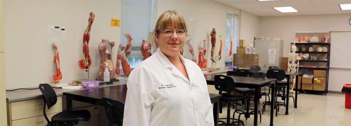 Biology instructor in biology lab