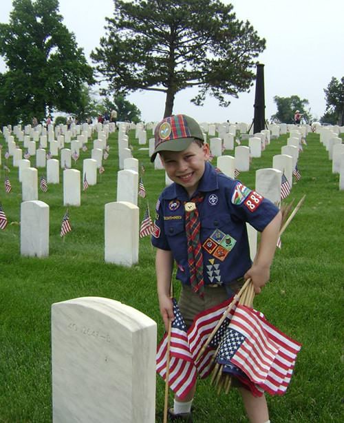 Gus Putting Out Flags at Jefferson Barracks by Janet Berry