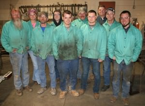 NineIntroduction to MIG Welding class students