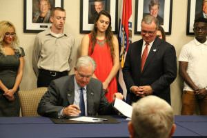 Missouri Governor Jay Nixon signs House Bill 2003