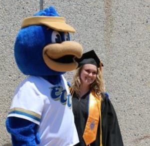 Member of 2016 graduating class with Franklin the Falcon