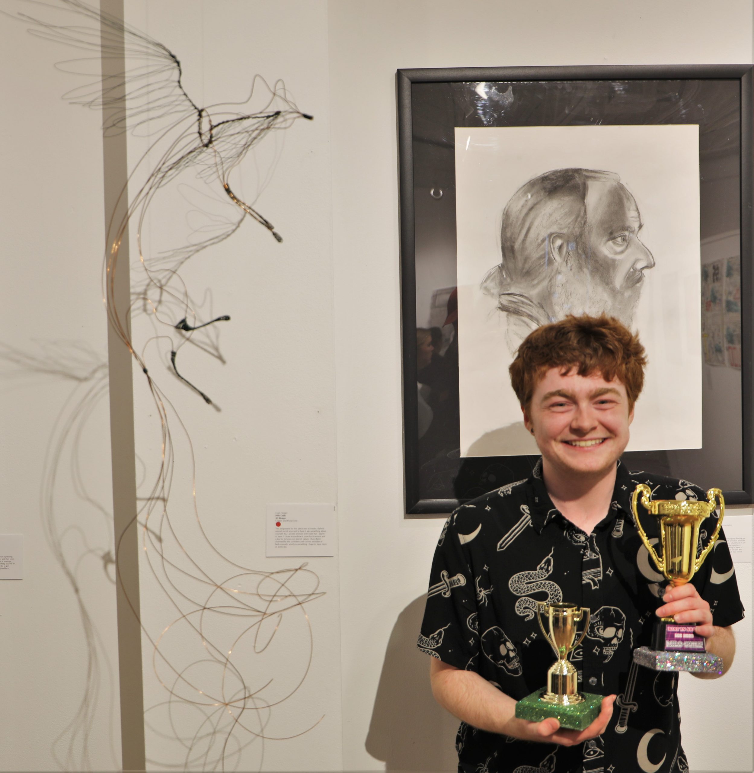 Student Milo Guile with Best of Show award