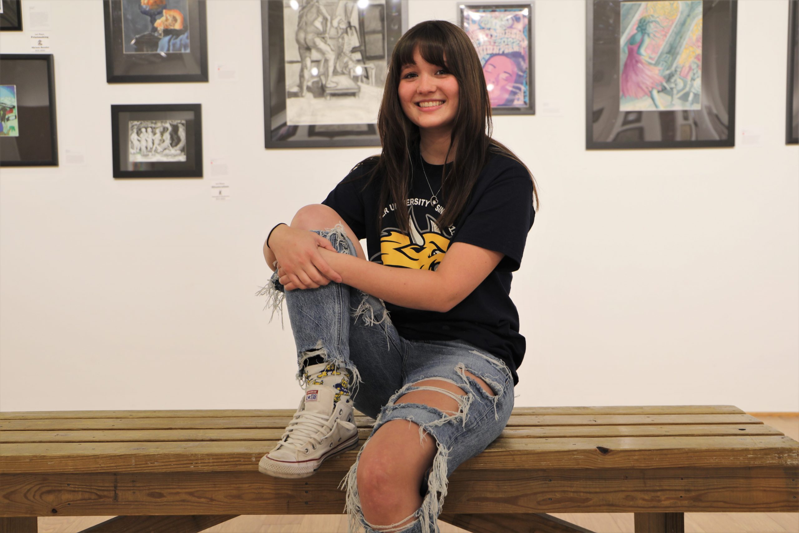 Parker Williamson posing in art gallery