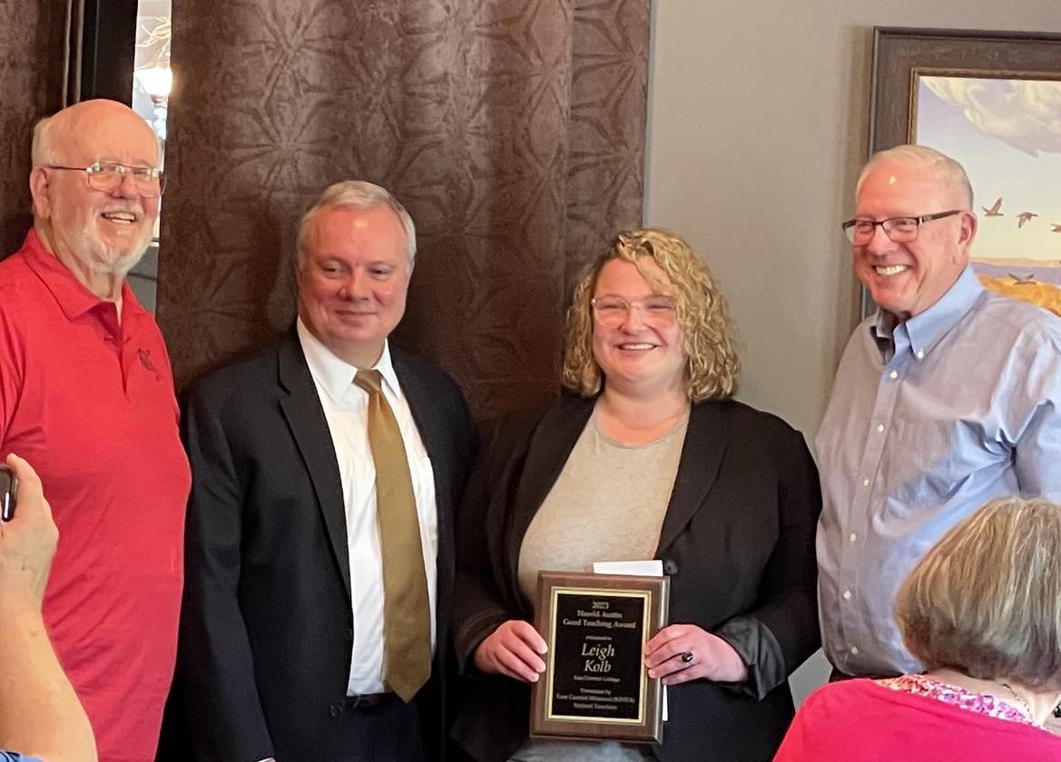 Leigh Kolb accepting Harold Austin Good Teaching Award