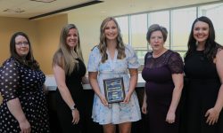 ECC instructors posing for photo with Missouri Baptist nursing student