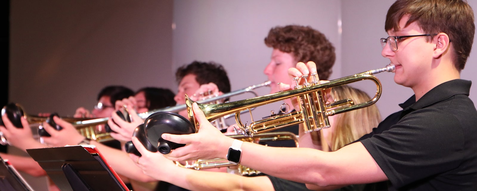 Band students practicing trumpet