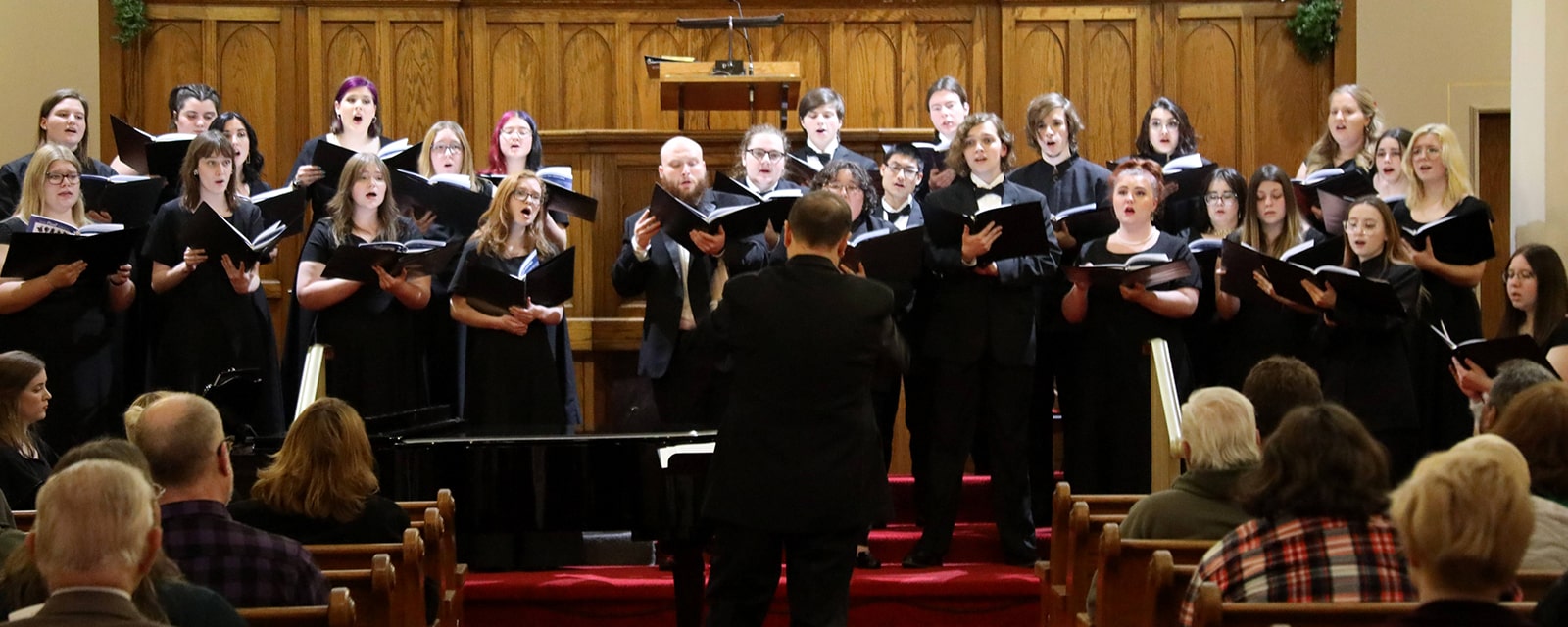 Choir students performing in church